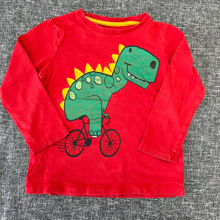 Boys 2-3 Year Red Long Sleeved Top With Green Dinosaur On A Bike Motif.