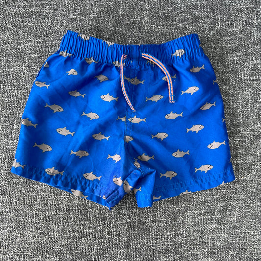 Boys 9-12 Month Blue Swim Shorts With Grey Shark Pattern.