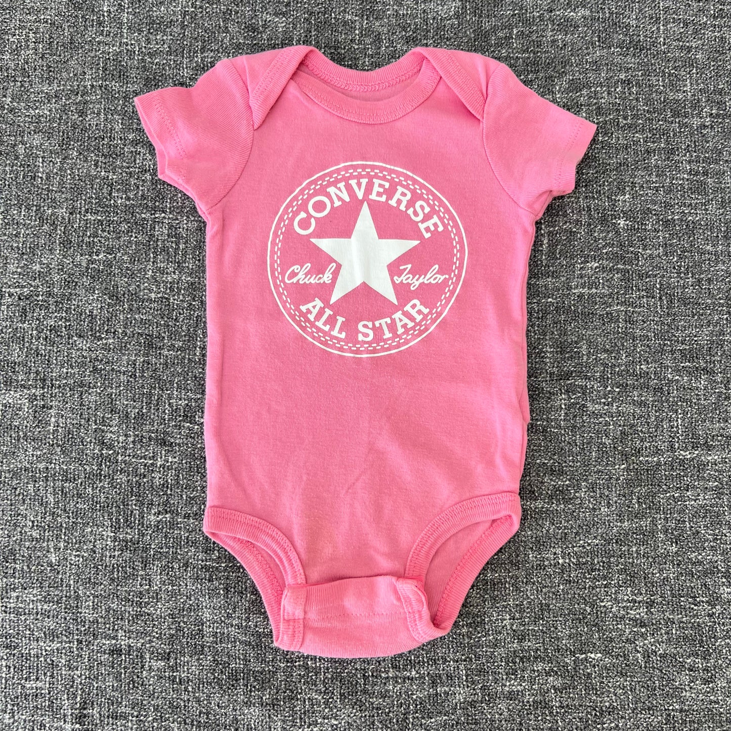 Girls 0-3 Month Pink Short Sleeved "Converse" Bodysuit.