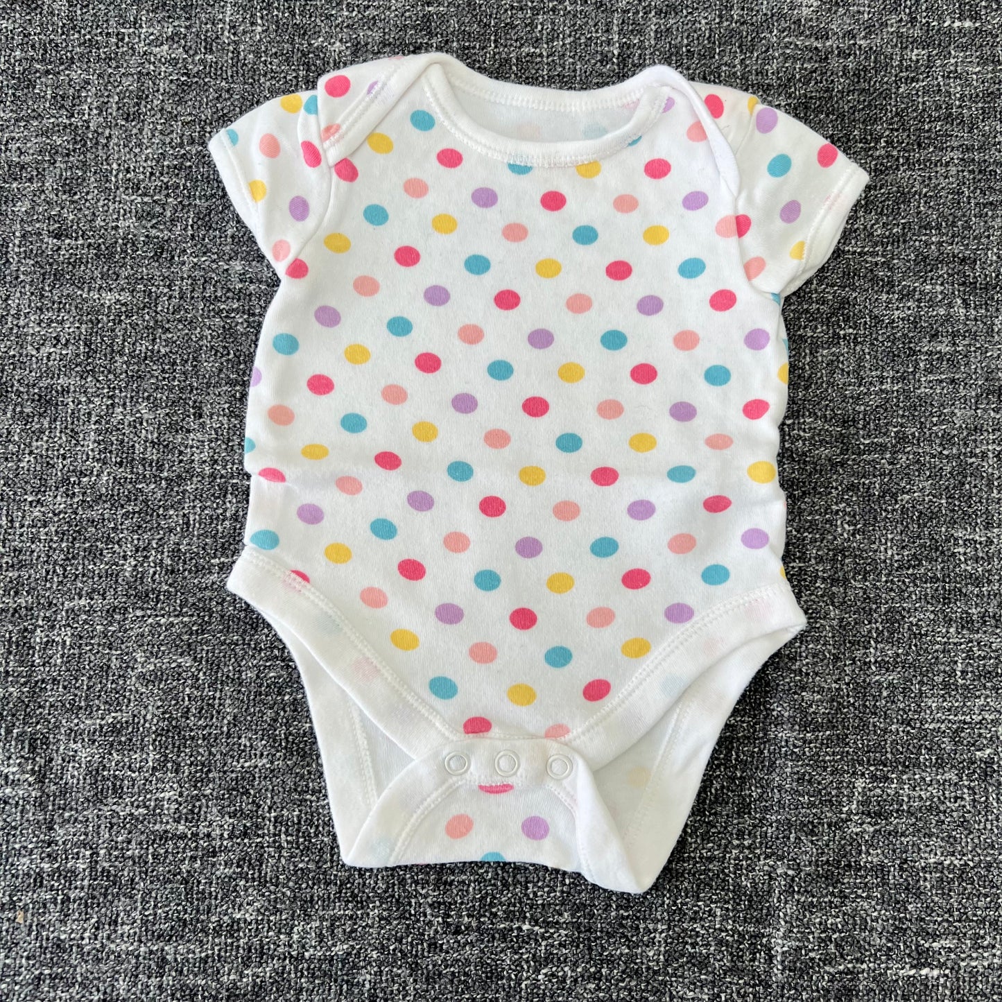 Girls 0-3 Month White Short Sleeved Bodysuit With Multi Coloured Spots.