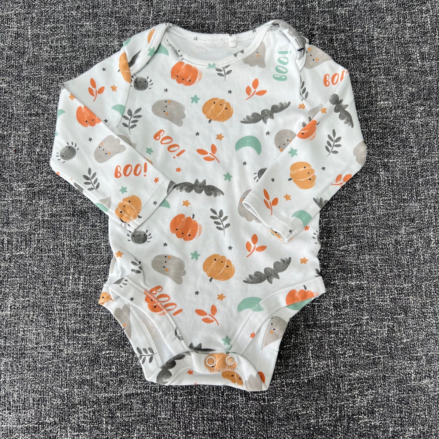 Boys / Girls 6-9 Month White Long Sleeved Bodysuit With Halloween Pattern.